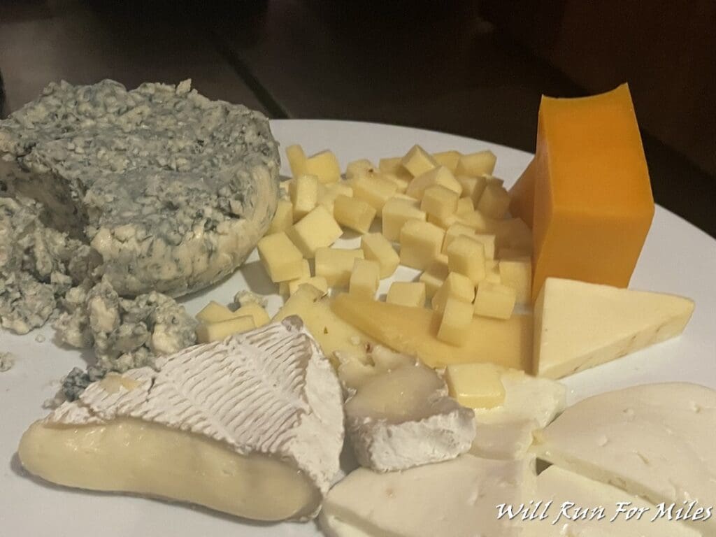 a plate of cheese on a table