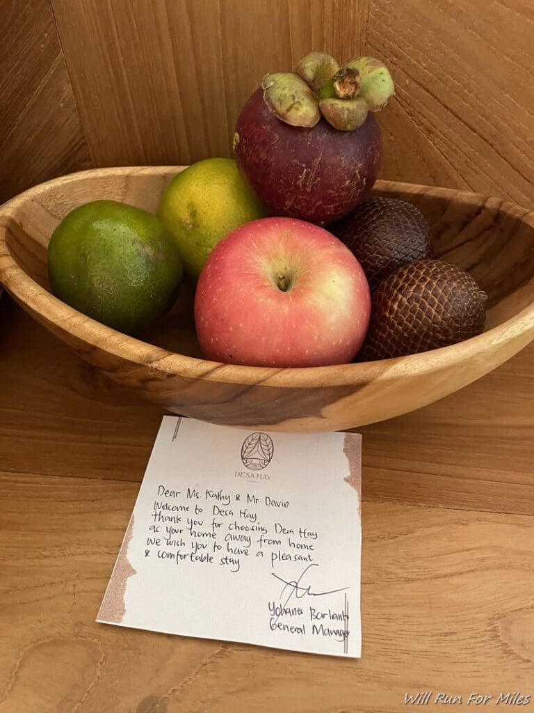 a bowl of fruit on a table