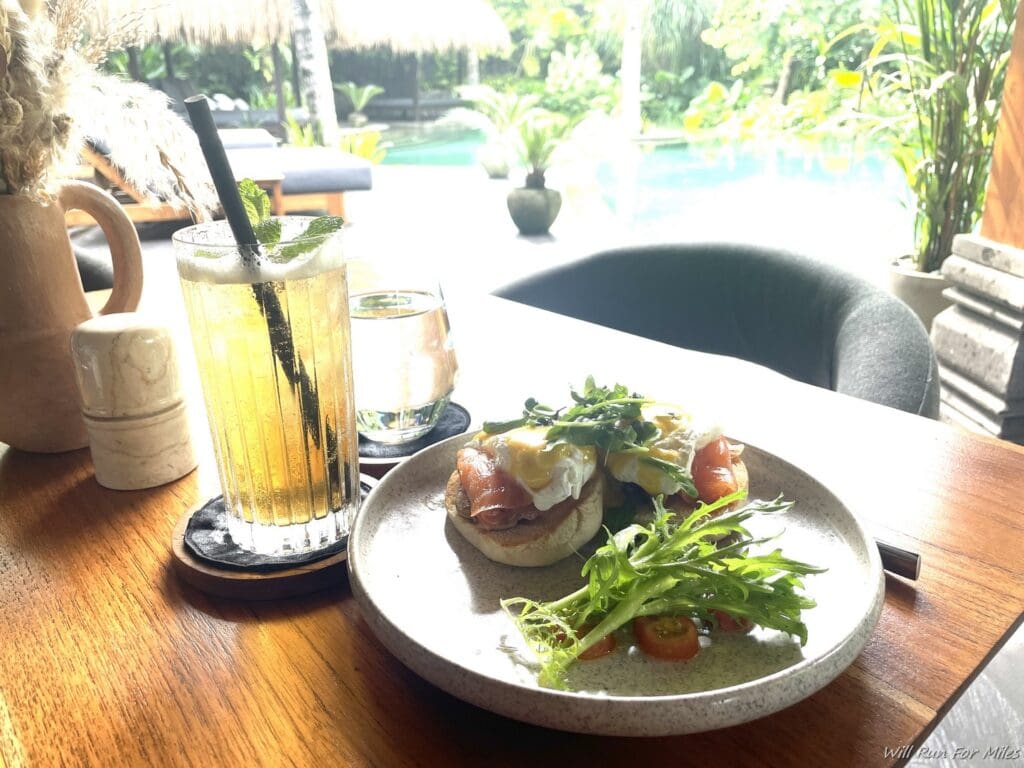 a plate of food and a drink on a table