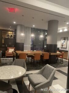 a room with a table and chairs