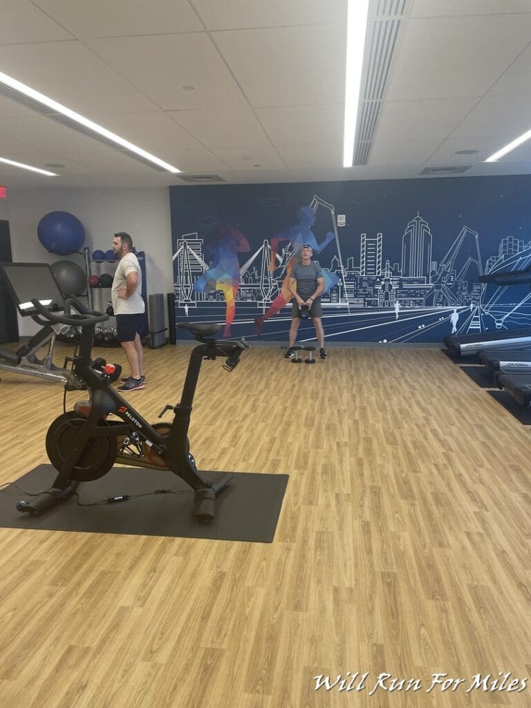 a group of people in a gym