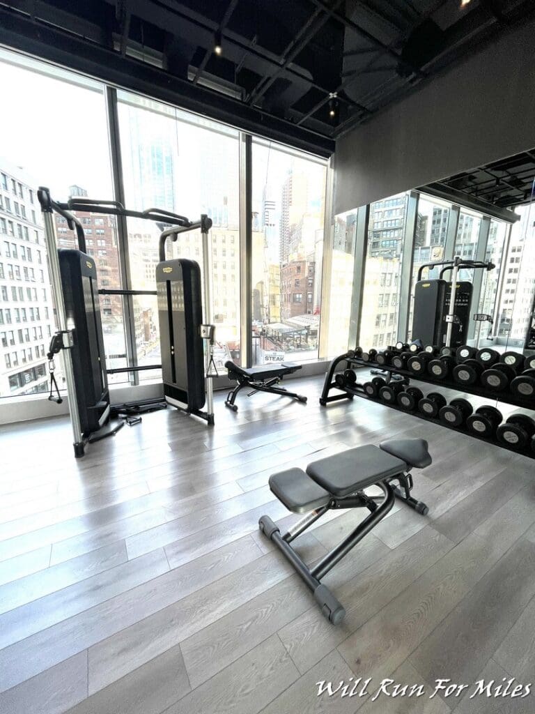 a gym with weights and exercise equipment