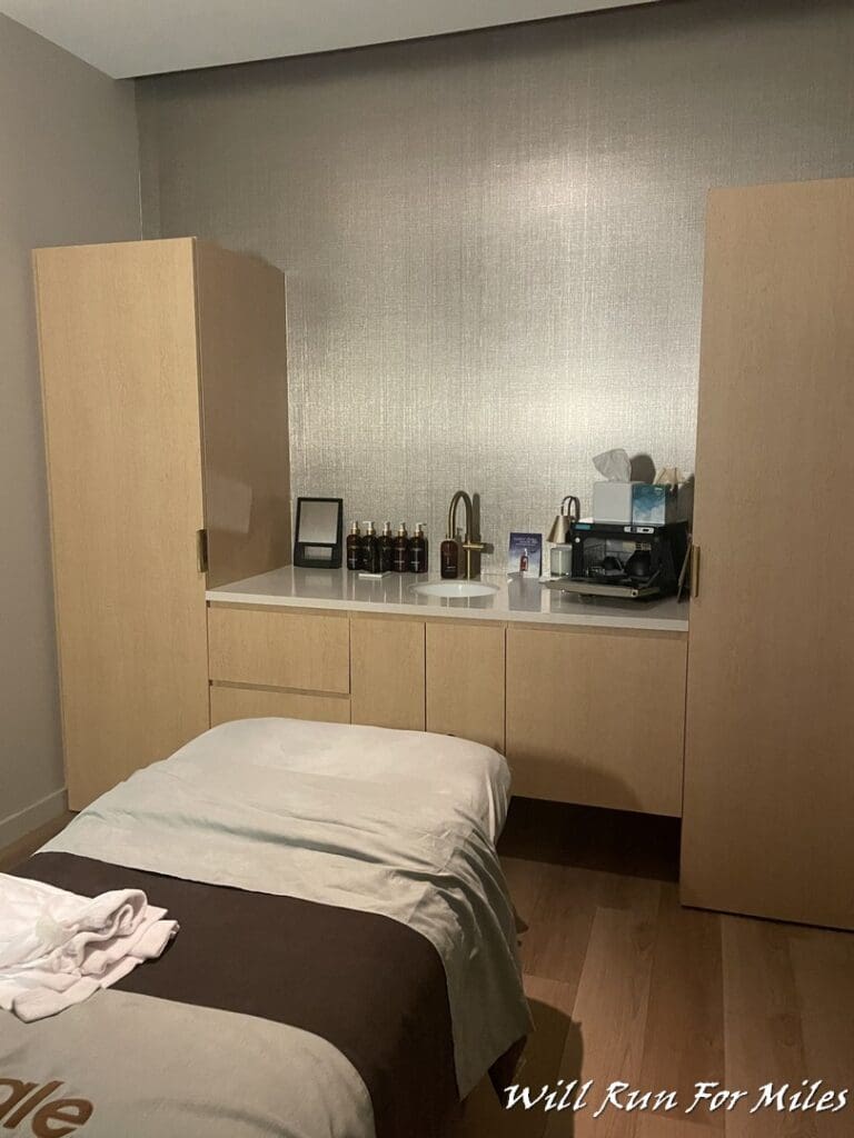 a bed with a coffee maker and a coffee machine