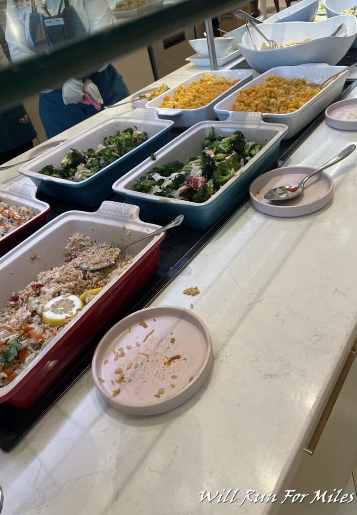 a row of food containers on a table