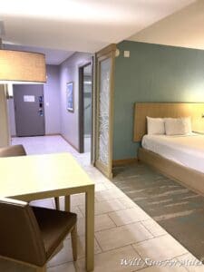 a room with a bed and a table
