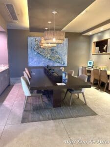 a room with a table and chairs