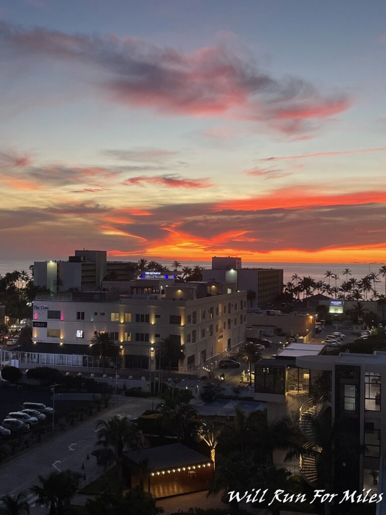 a sunset over a city