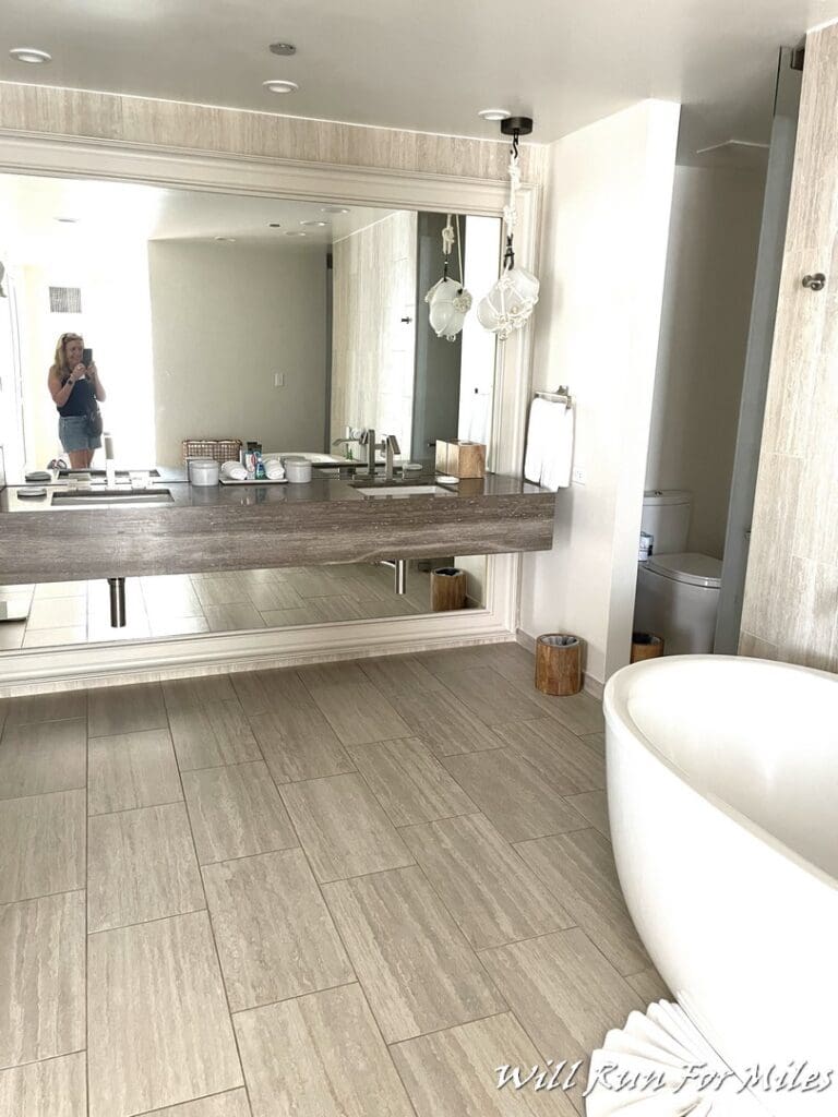 a bathroom with a tub and a sink