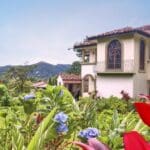 a house with a garden and flowers