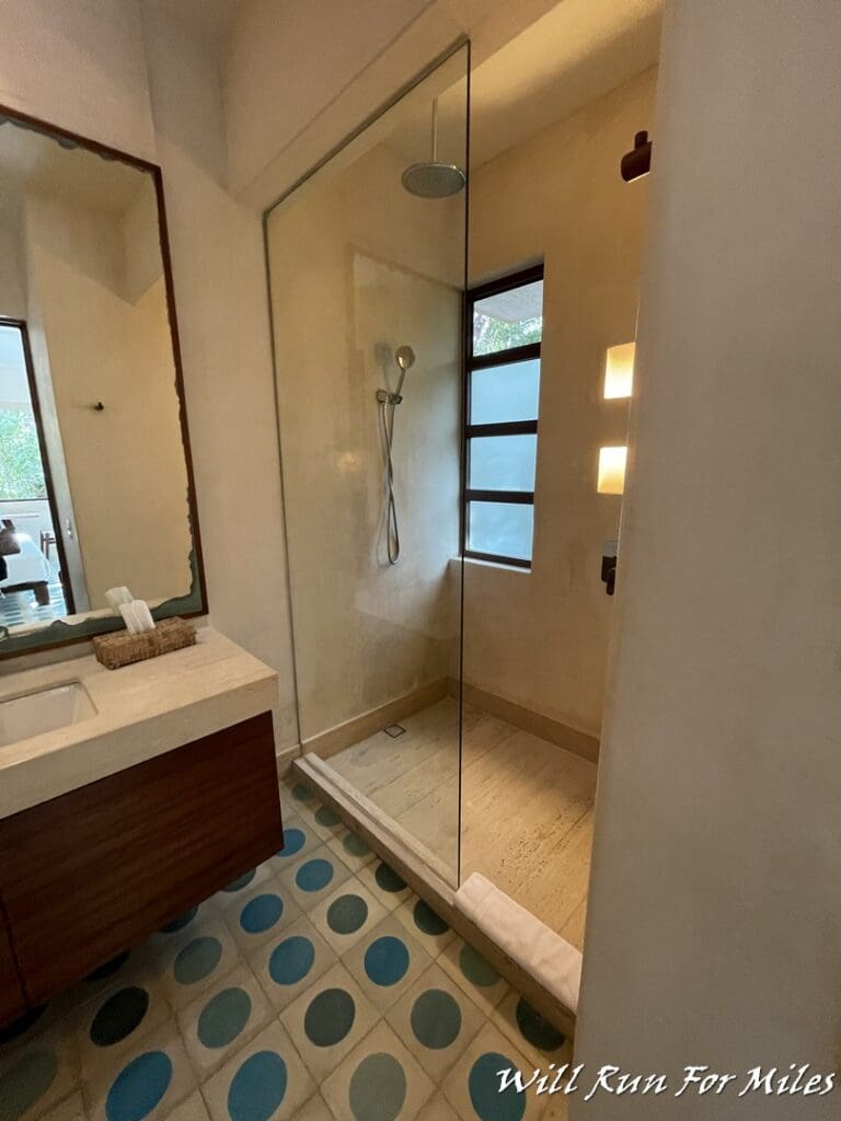 a bathroom with a glass shower