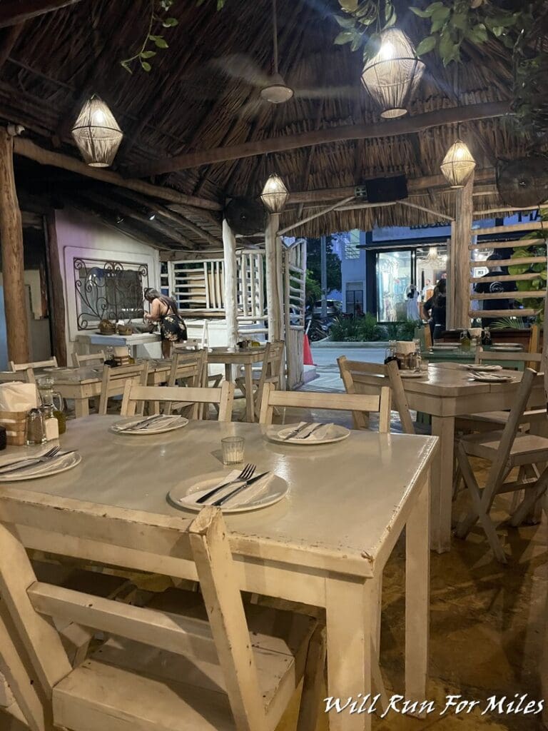 a restaurant with tables and chairs