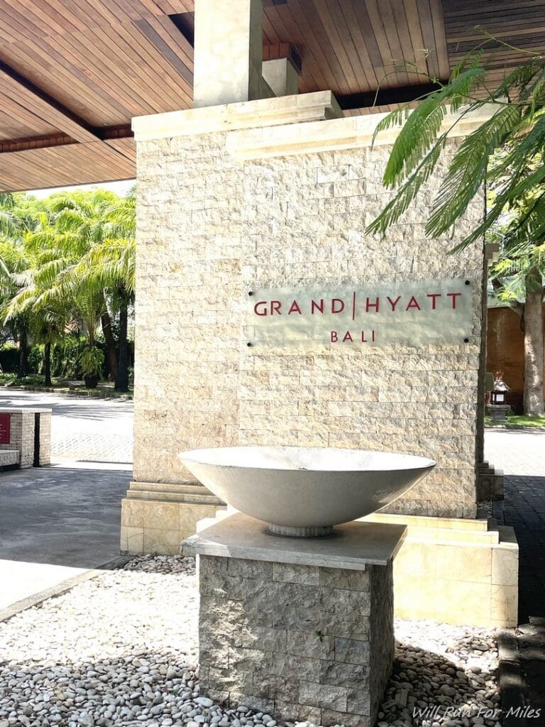 a stone wall with a bowl on it