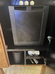 a black rectangular object on a shelf