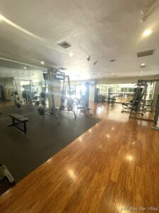 a gym with weights and equipment