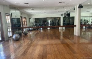 a mirror wall with a mirror and balls on it