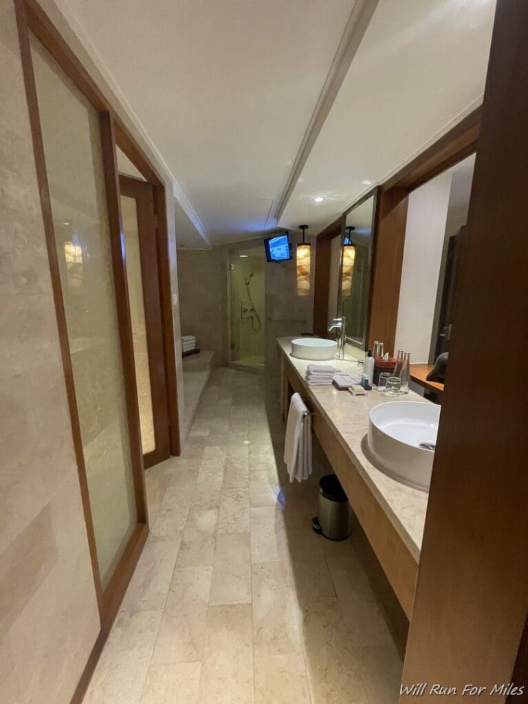 a bathroom with a mirror and sink