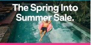 a man floating on a pink donut in a pool