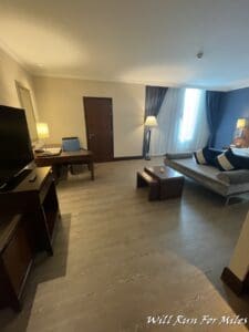 a room with a couch and a television