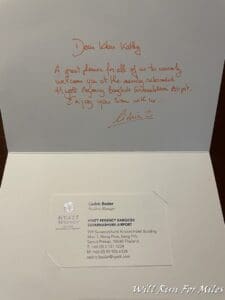 a white envelope with orange writing on it