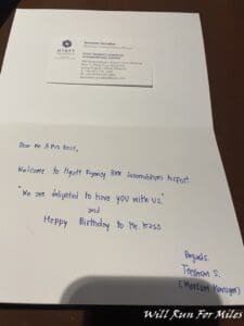 a white envelope with blue writing on it