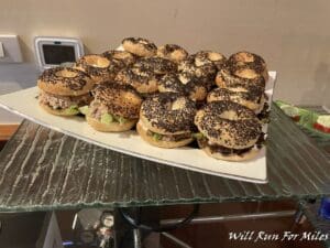 a plate of bagels on a glass surface