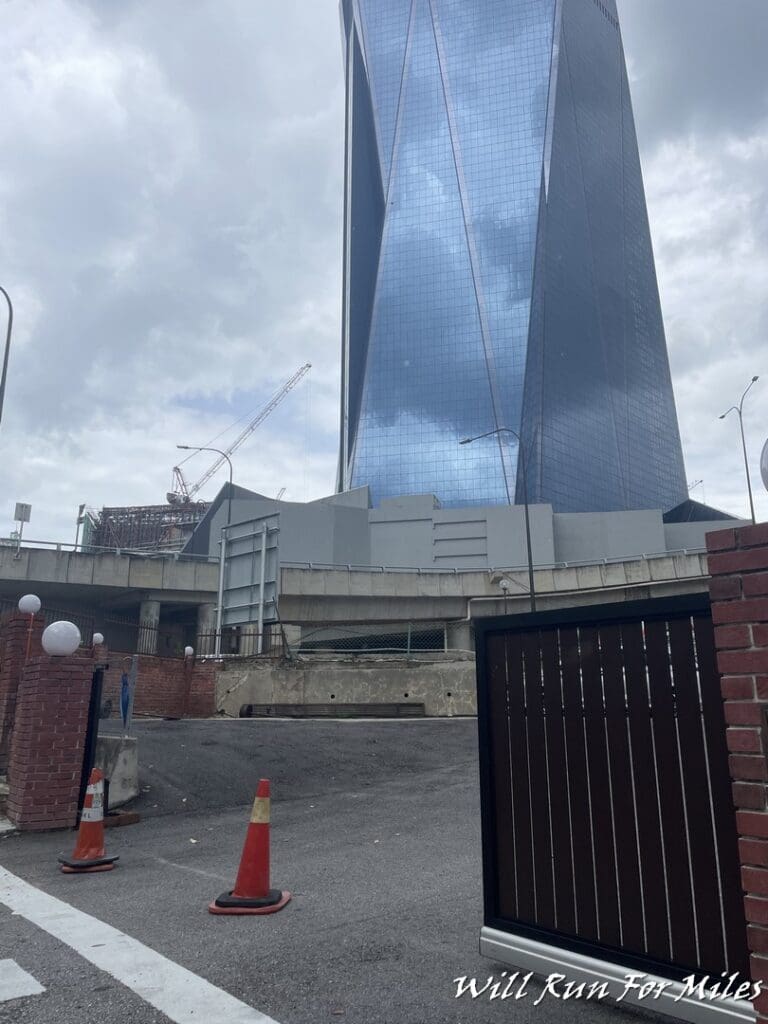 a tall building with a blue sky behind it
