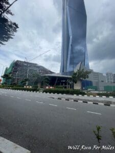 a tall building next to a road