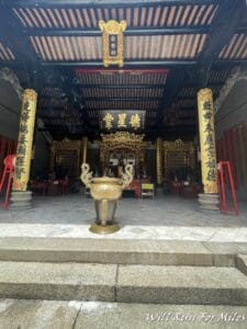 a temple with a gold bowl