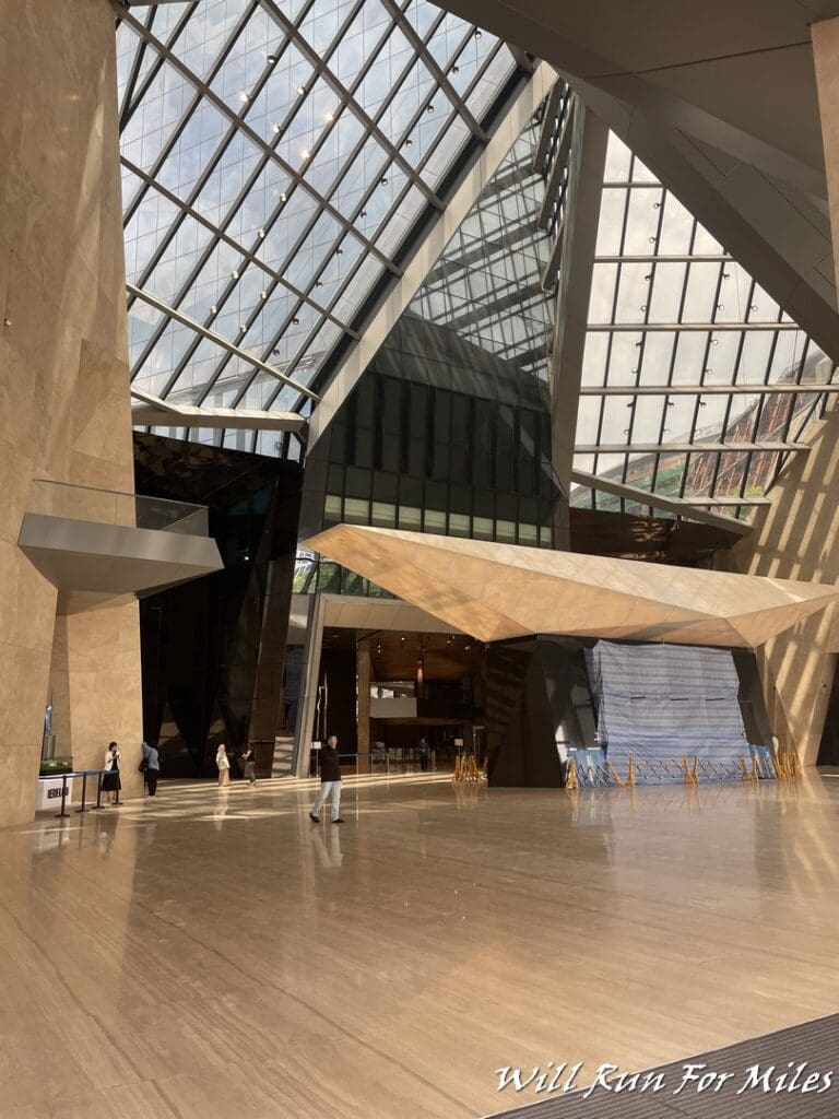 a large glass building with a large ceiling
