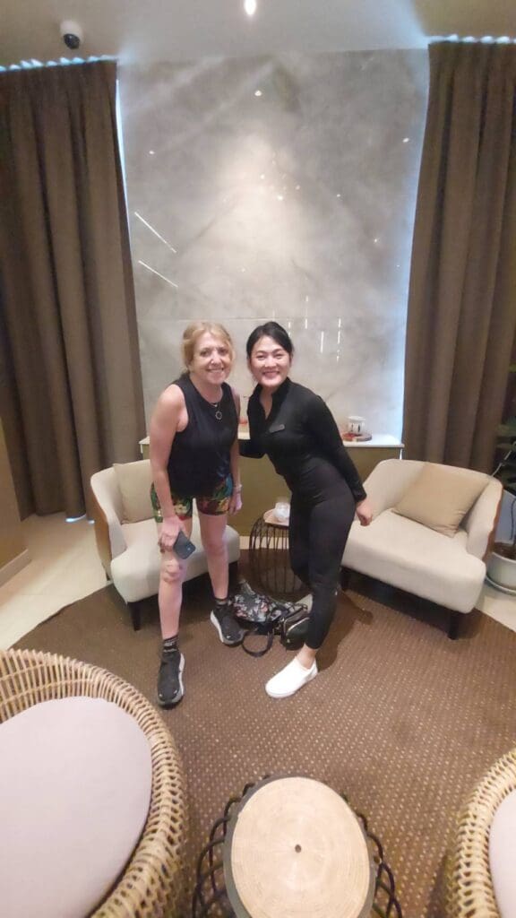 two women standing in a room
