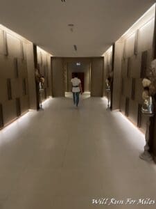 a person walking in a hallway