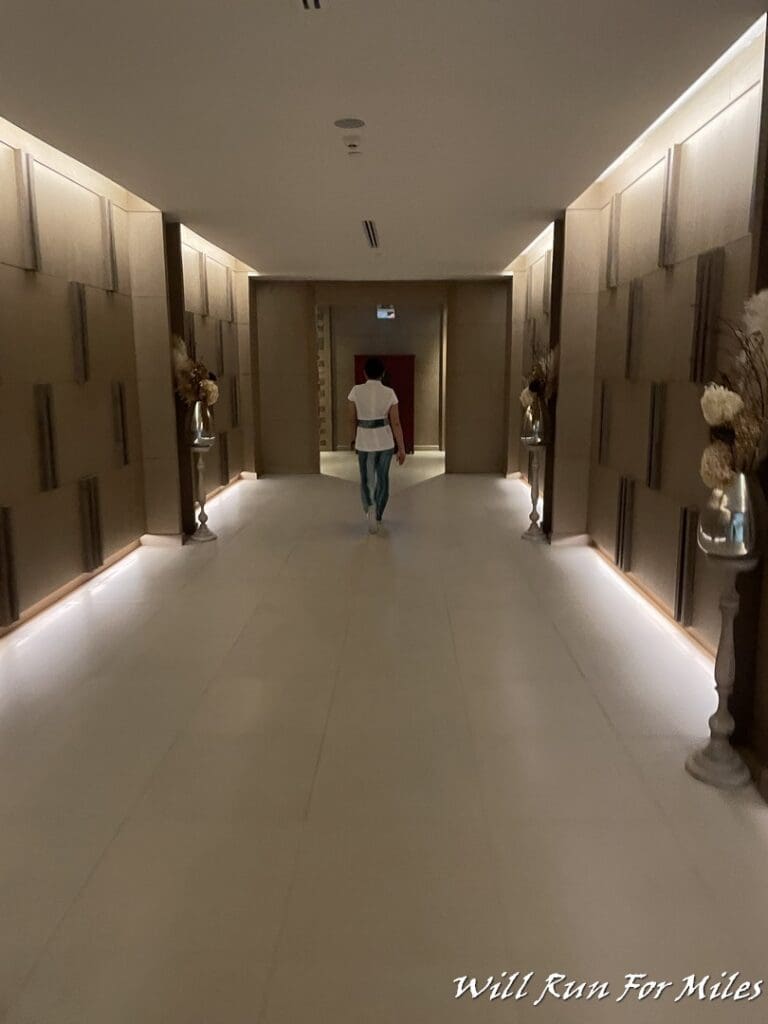 a person walking in a hallway