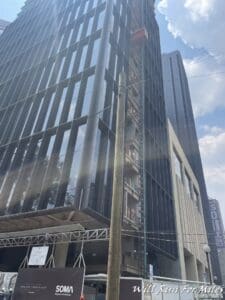 a tall building with glass windows