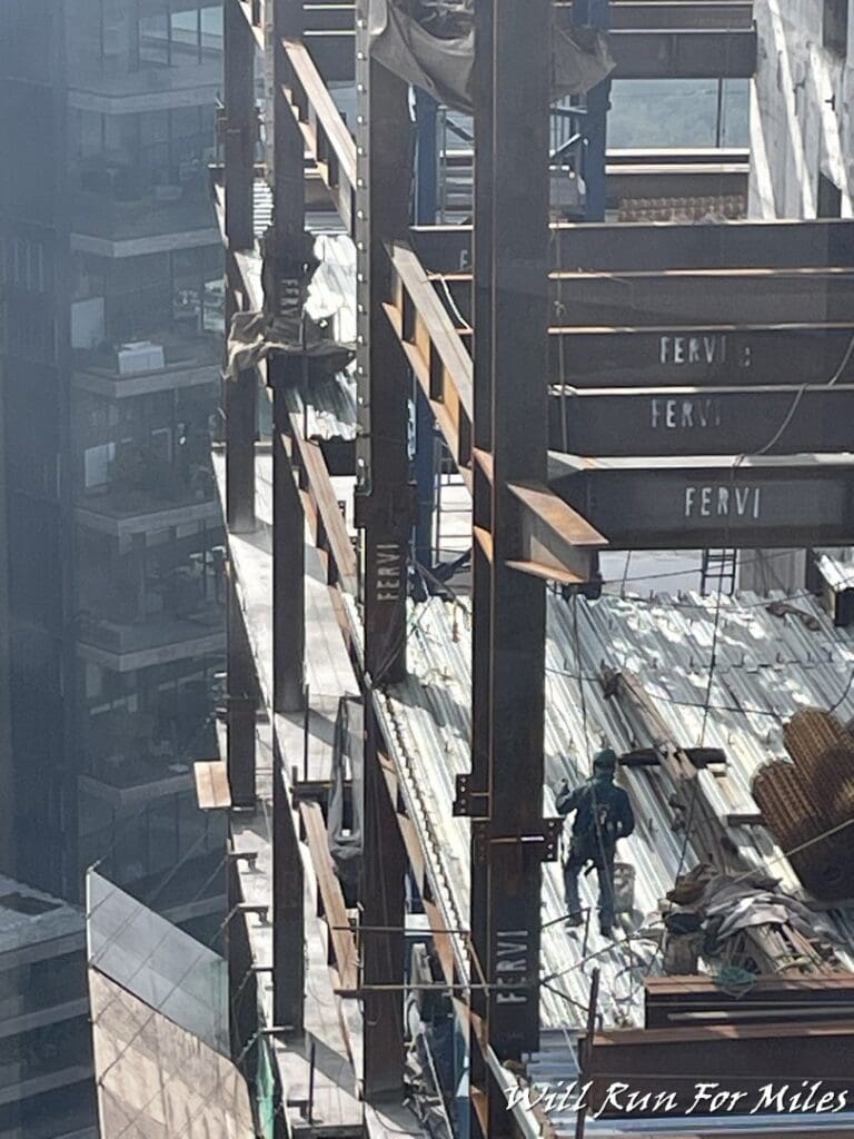 a man walking on a construction site