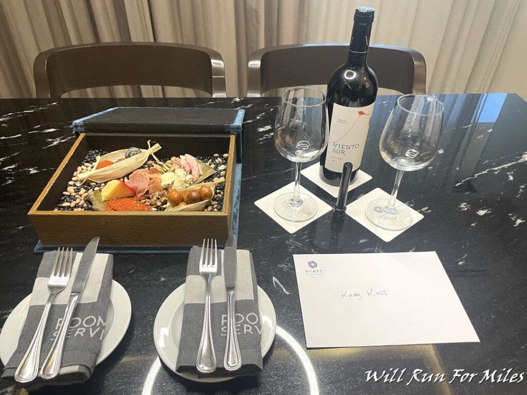a table with wine and food on it