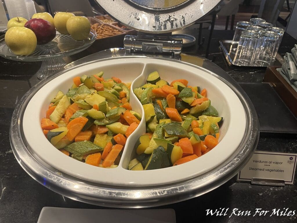 a bowl of vegetables in a buffet
