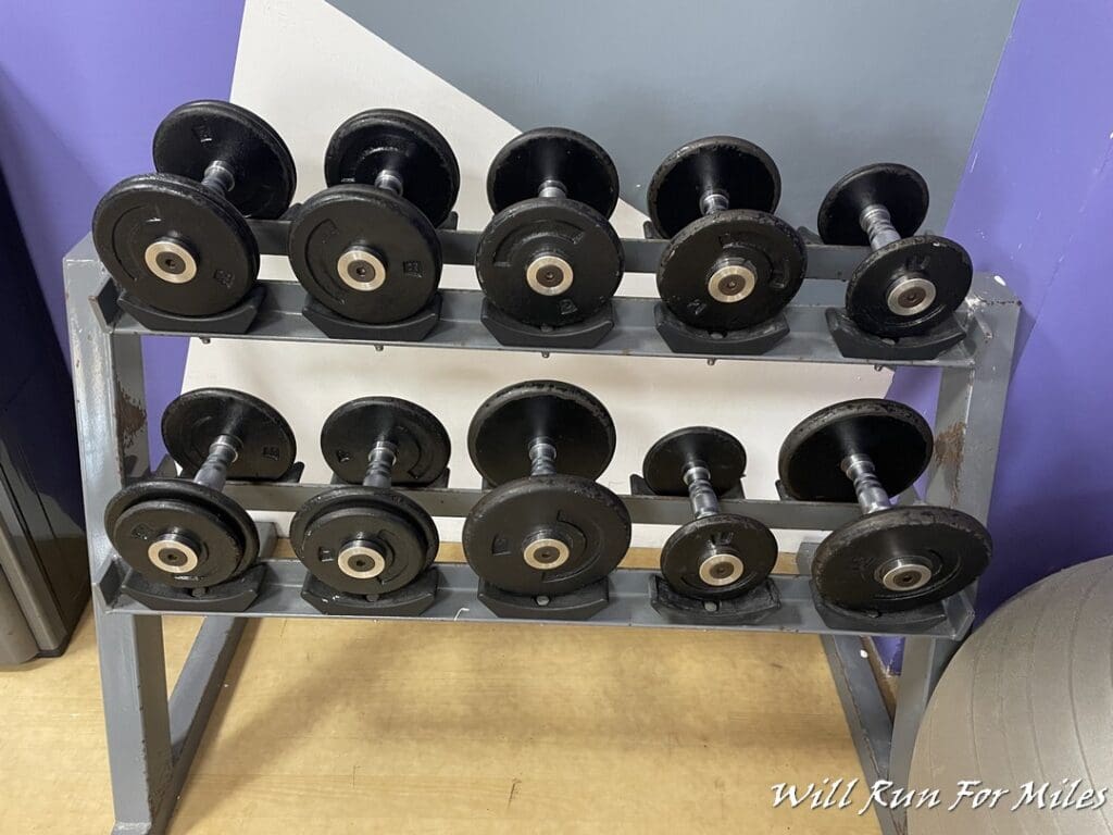 a rack of weights on a floor