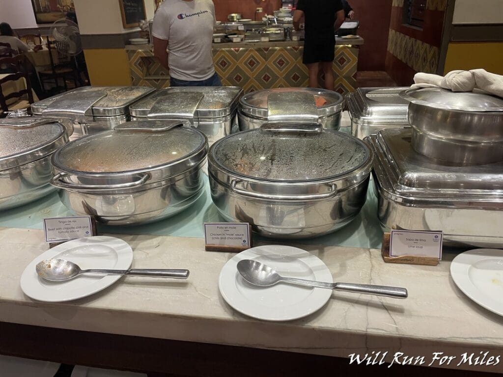 a group of metal containers on a counter
