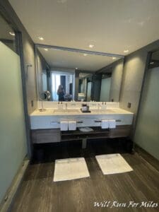 a bathroom with a mirror and sink