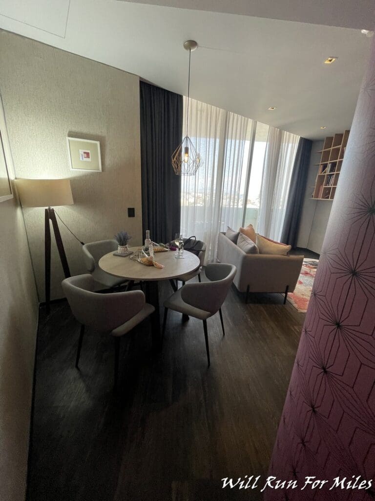a room with a table and chairs