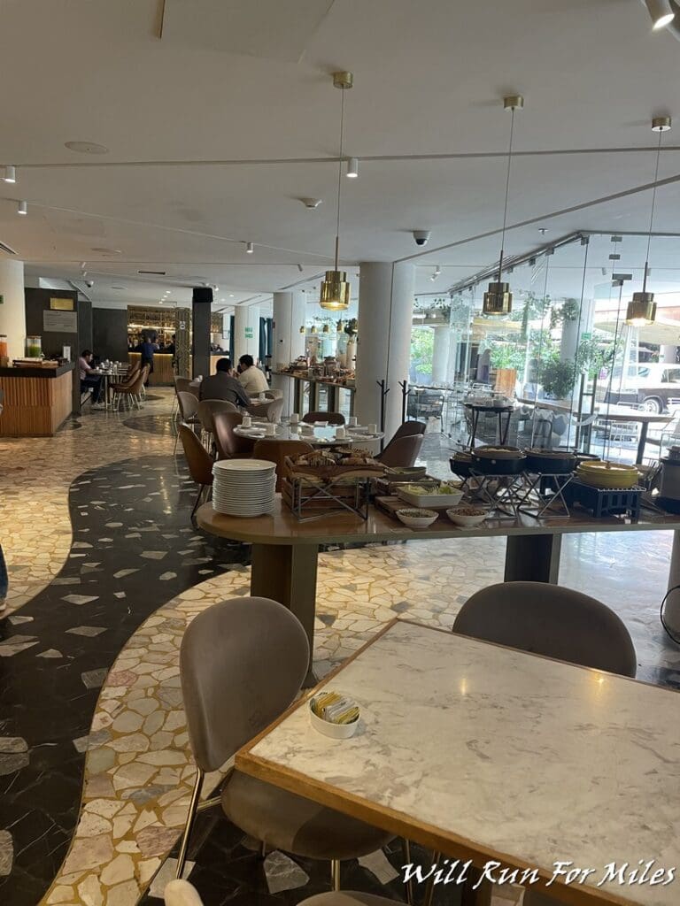 a restaurant with tables and chairs