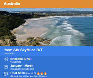 a beach with trees and land