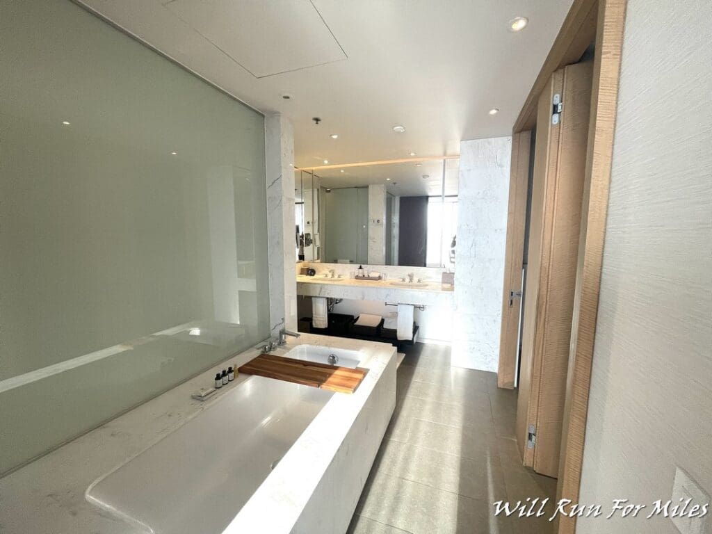 a bathroom with a tub and sink