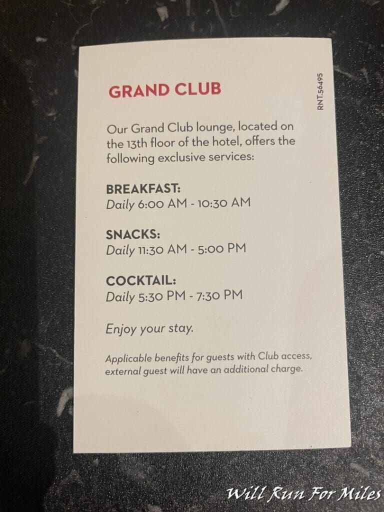 a white and black card with red text