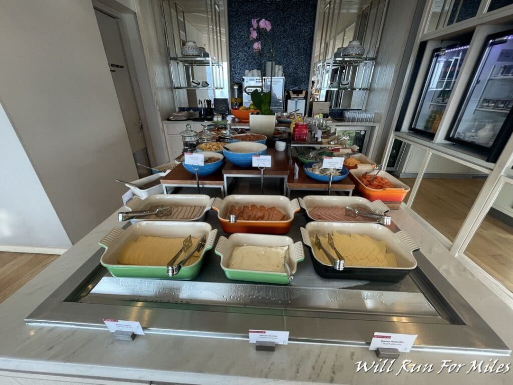 a buffet table with food in it