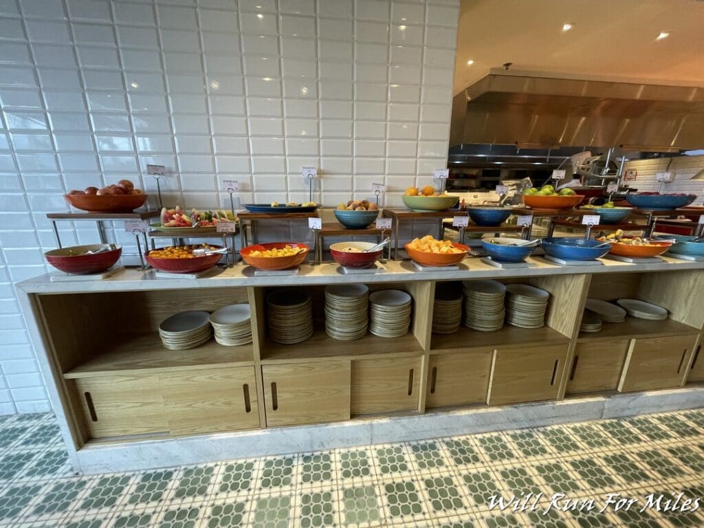 a buffet with different bowls of food