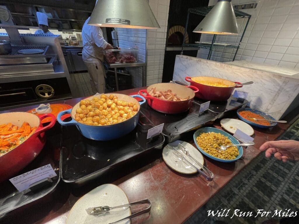 a large group of pots of food