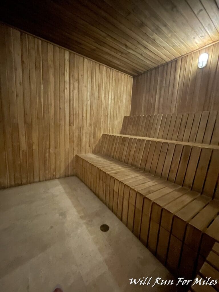 a wooden bench in a room