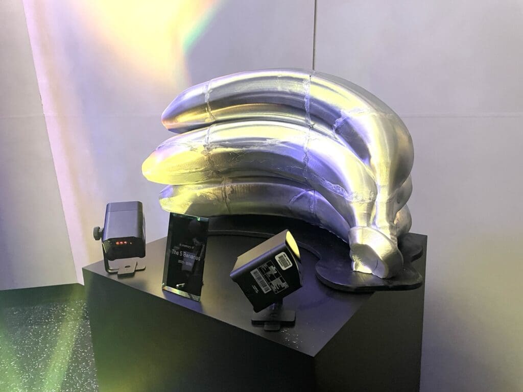 a silver object on a black box