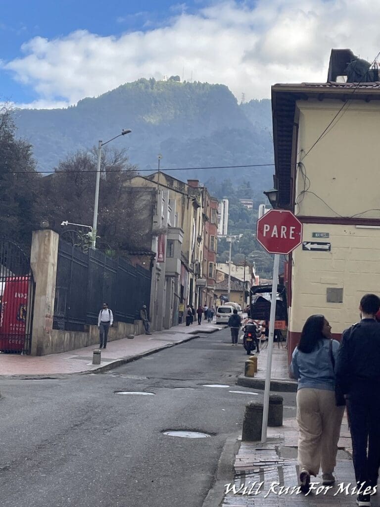 a group of people walking on a street
